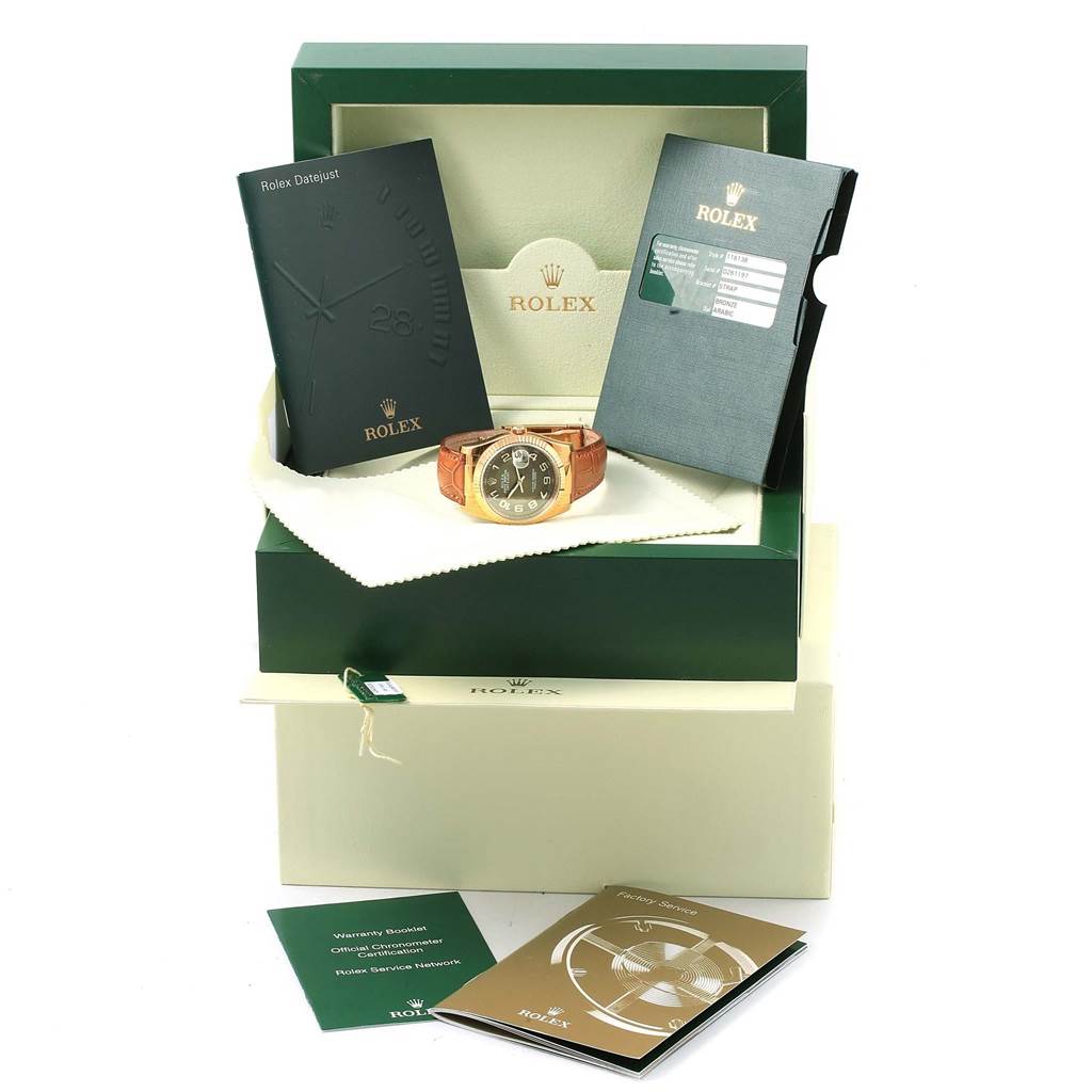 The image shows a Rolex President 116138 Men's Yellow Gold Brown Dial 116138 Men's Yellow Gold Brown Dial model watch displayed with its open box and accompanying documents from a front angle.