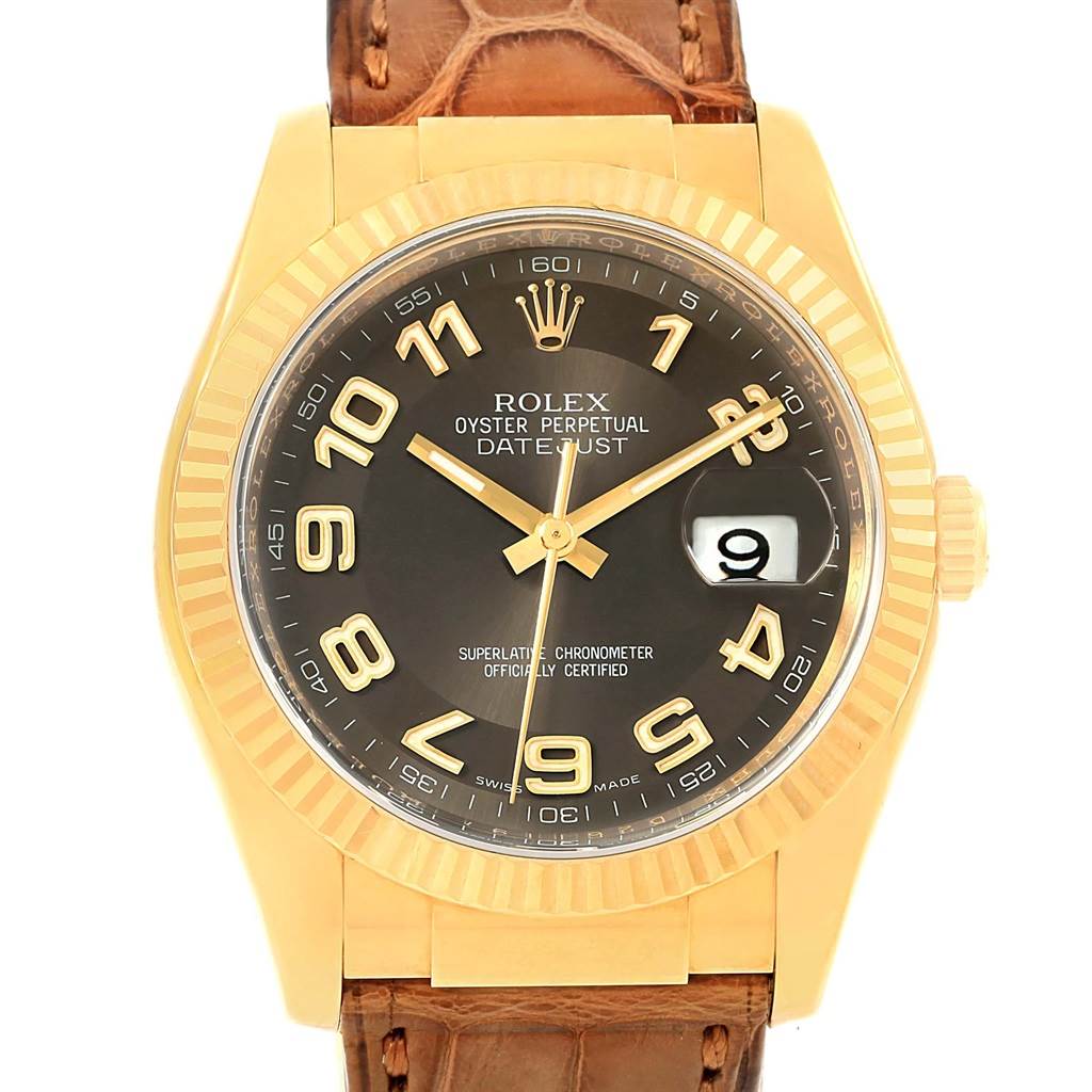 The image shows the front view of a Rolex President 116138 Men's Yellow Gold Brown Dial 116138 Men's Yellow Gold Brown Dial model watch with a black dial and brown leather strap.