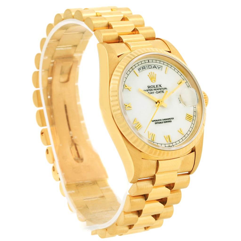 The Rolex President 18238 Men's Yellow Gold Champagne Dial 18238 Men's Yellow Gold Champagne Dial model watch is shown at an angled view, highlighting its gold bracelet, case, and white dial with Roman numerals.