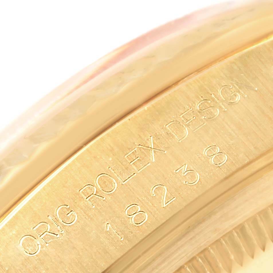 This close-up image shows the engraved serial number and design details on the case side of the Rolex President 18238 Men's Yellow Gold Champagne Dial 18238 Men's Yellow Gold Champagne Dial model.
