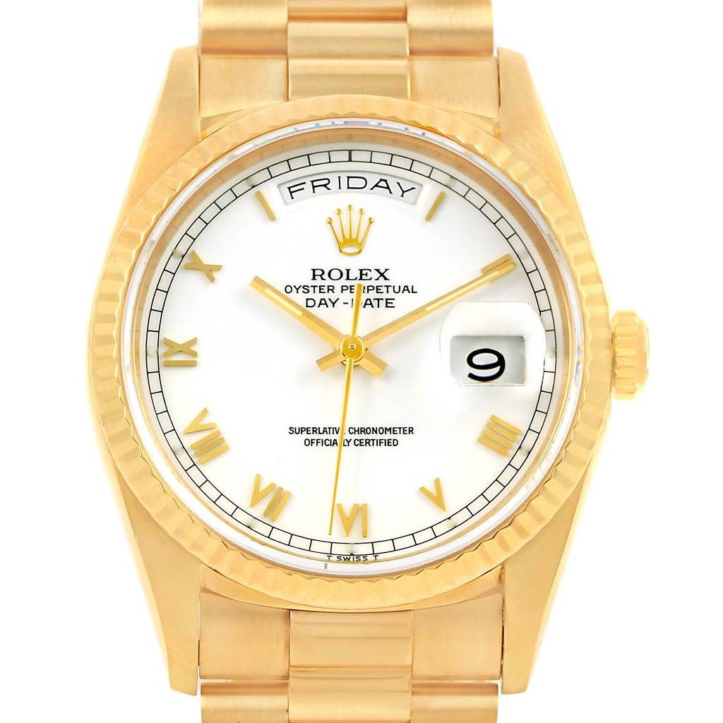 This image shows a frontal view of a Rolex President 18238 Men's Yellow Gold Champagne Dial 18238 Men's Yellow Gold Champagne Dial model, highlighting the dial, hands, day, and date indicators.