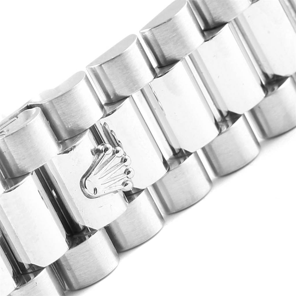 This image shows a close-up angle of the bracelet for the Rolex President 118206 Men's Platinum Silver Dial 118206 Men's Platinum Silver Dial model watch, highlighting its link and crown logo.
