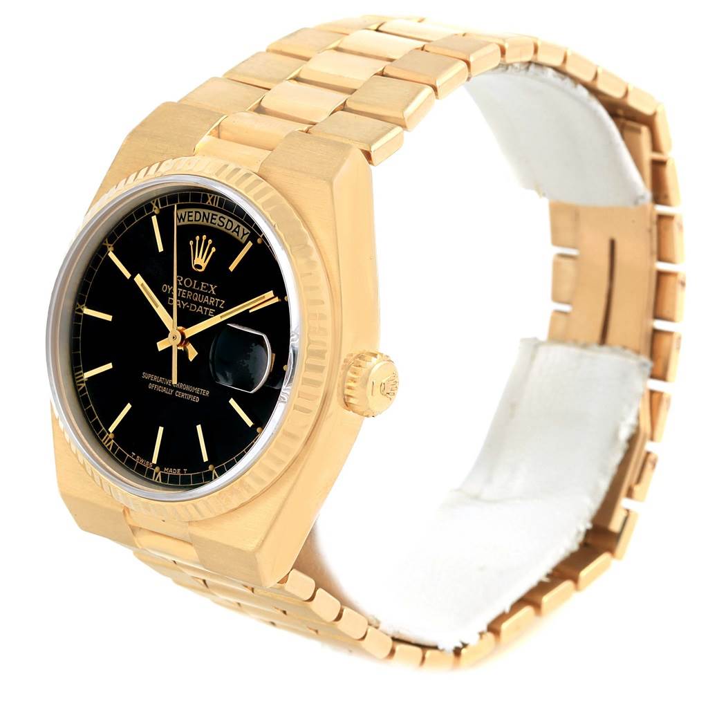 The Rolex President 19018 Men
s Yellow Gold Black Dial 19018 Men
s Yellow Gold Black Dial model watch is shown at an angled side view, featuring the bracelet, crown, and face.