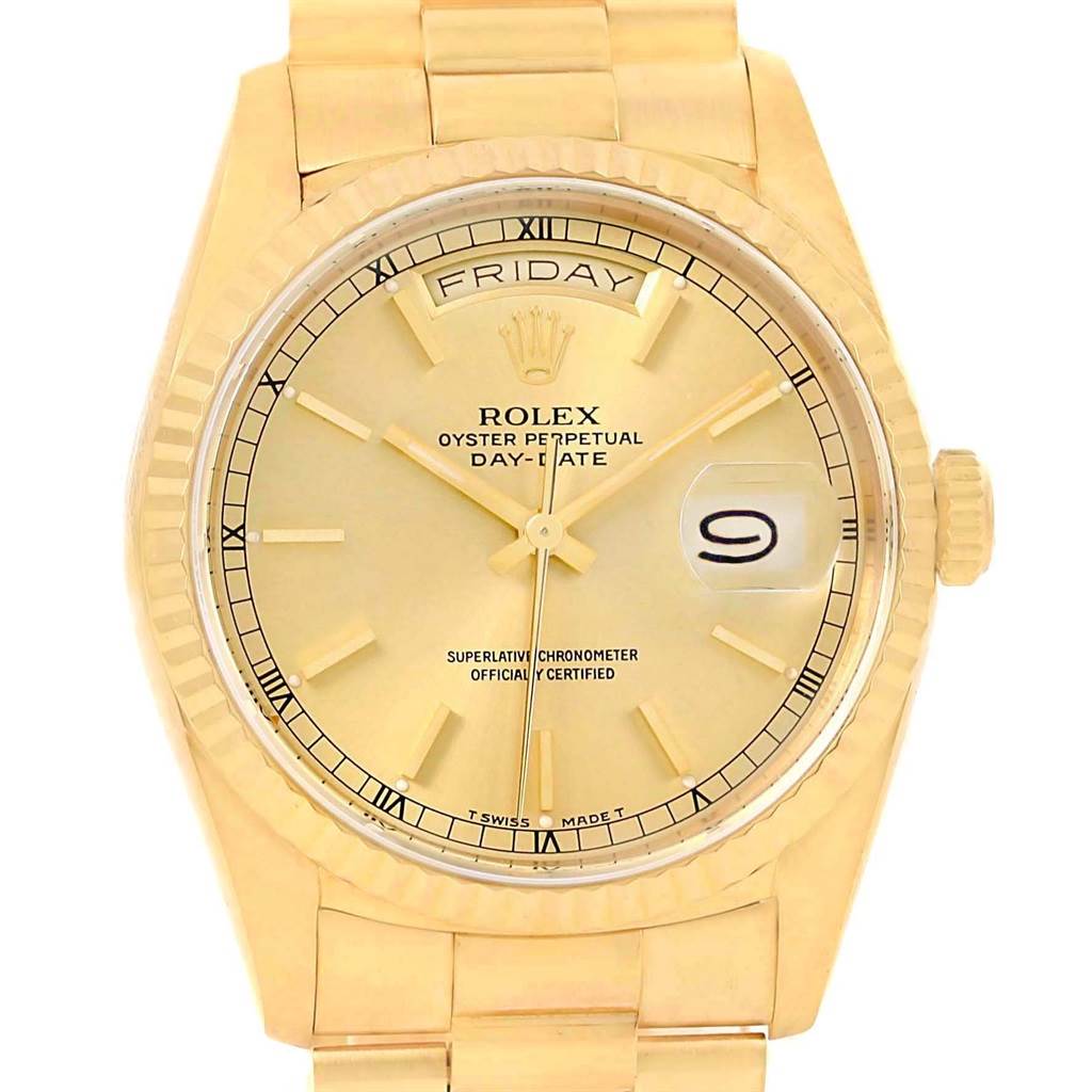 The image shows a front close-up of a Rolex President 18238 Men's Yellow Gold Champagne Dial 18238 Men's Yellow Gold Champagne Dial model watch, featuring the dial, day and date indicators, and part of the bracelet.