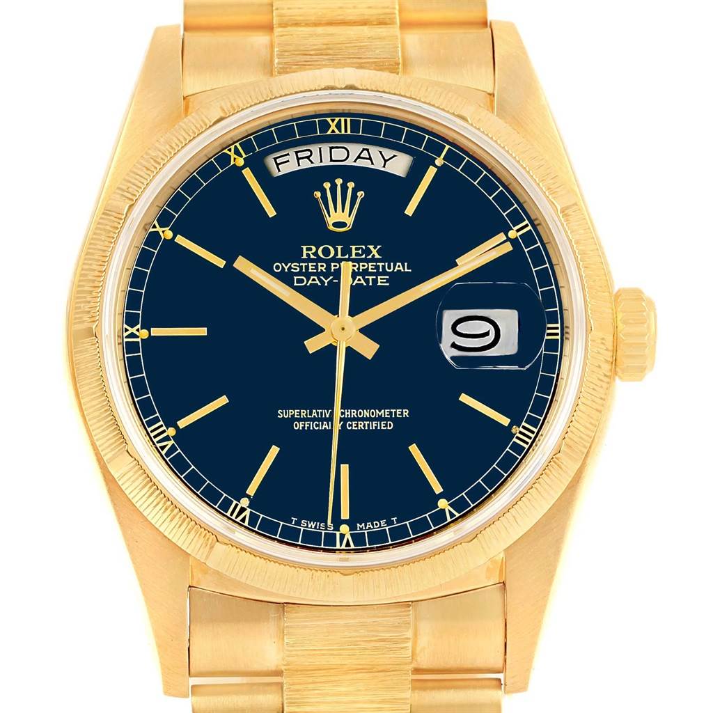 The image shows a frontal view of the Rolex President 18078 Men
s Yellow Gold Blue Dial 18078 Men
s Yellow Gold Blue Dial model watch highlighting the dial, day/date display, and strap.