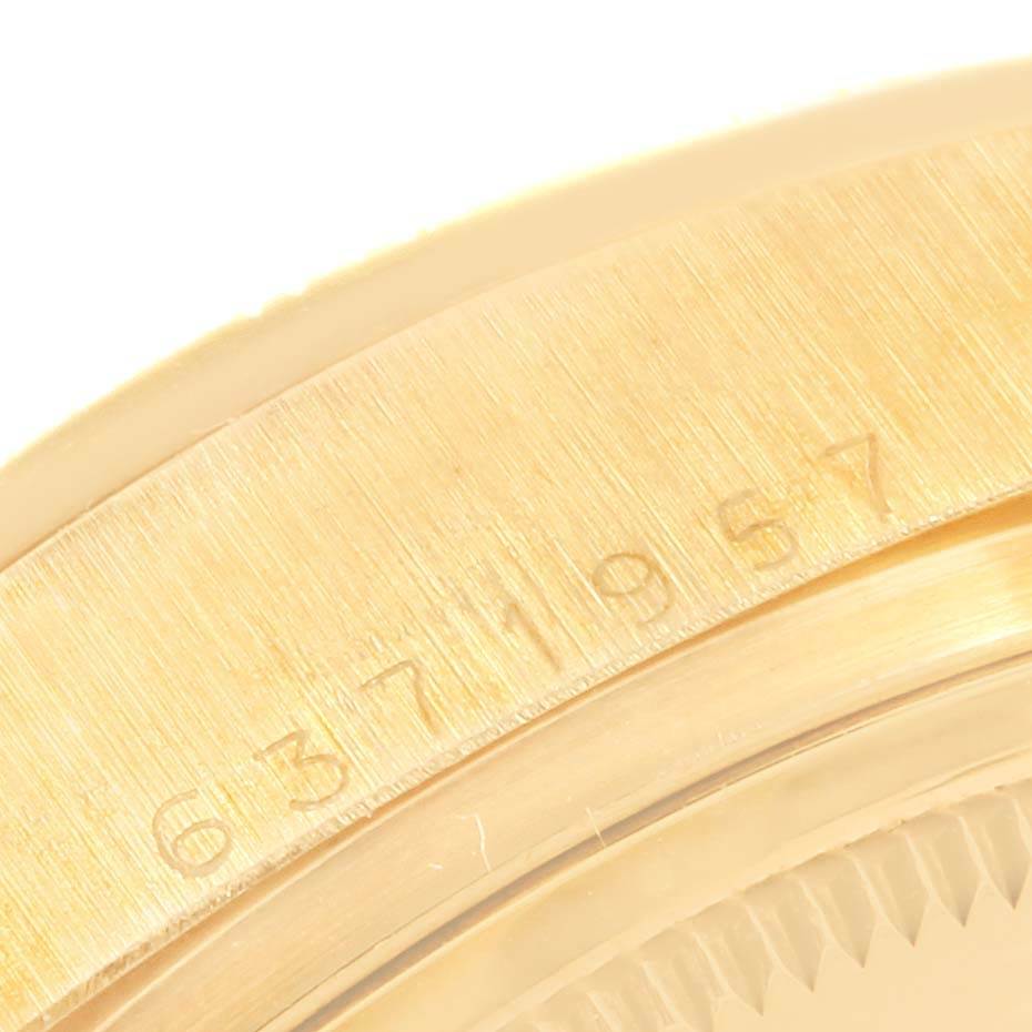 This is a close-up of the serial number engraving on the case of a Rolex President 18078 Men
s Yellow Gold Blue Dial 18078 Men
s Yellow Gold Blue Dial model watch.