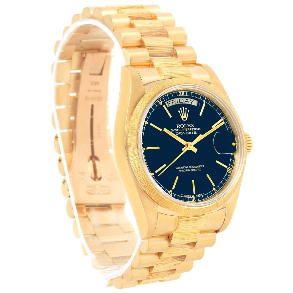 The image shows a gold Rolex President 18078 Men
s Yellow Gold Blue Dial 18078 Men
s Yellow Gold Blue Dial model watch, angled to display the face, day-date display, and part of the band.