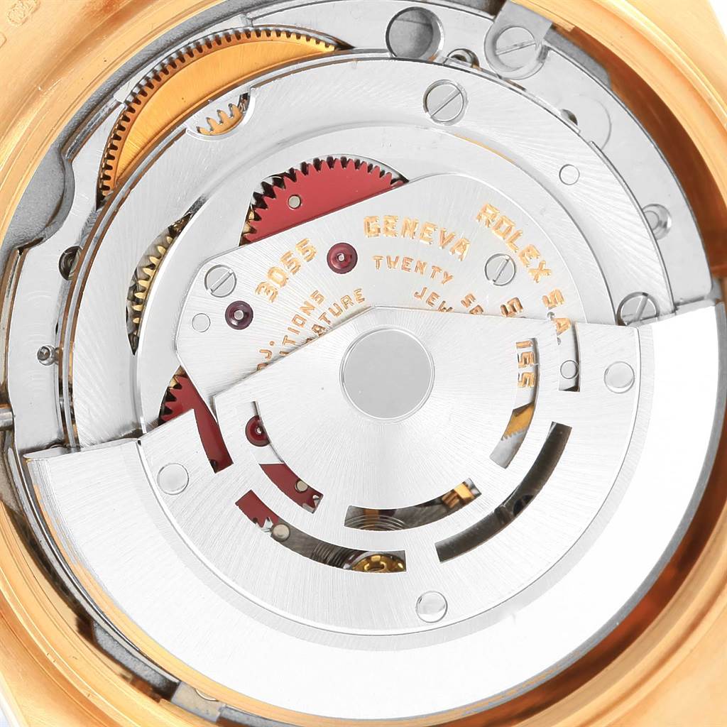 This image shows the intricate internal mechanism of the Rolex President 18078 Men
s Yellow Gold Blue Dial 18078 Men
s Yellow Gold Blue Dial model watch, viewed from its case back.