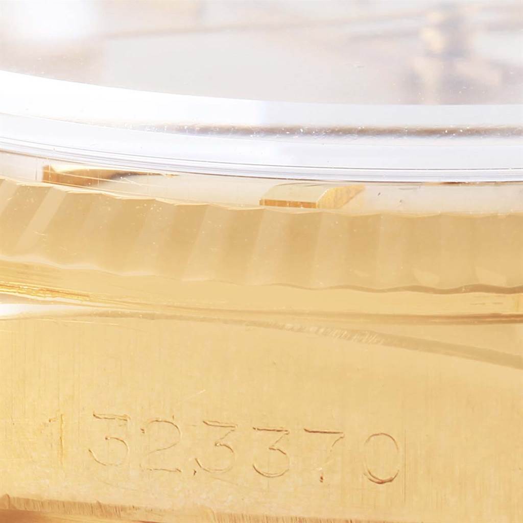 The image shows a close-up of the side of a Rolex President 1803 Men's Yellow Gold Silver Dial 1803 Men's Yellow Gold Silver Dial model watch, highlighting the case and serial number.