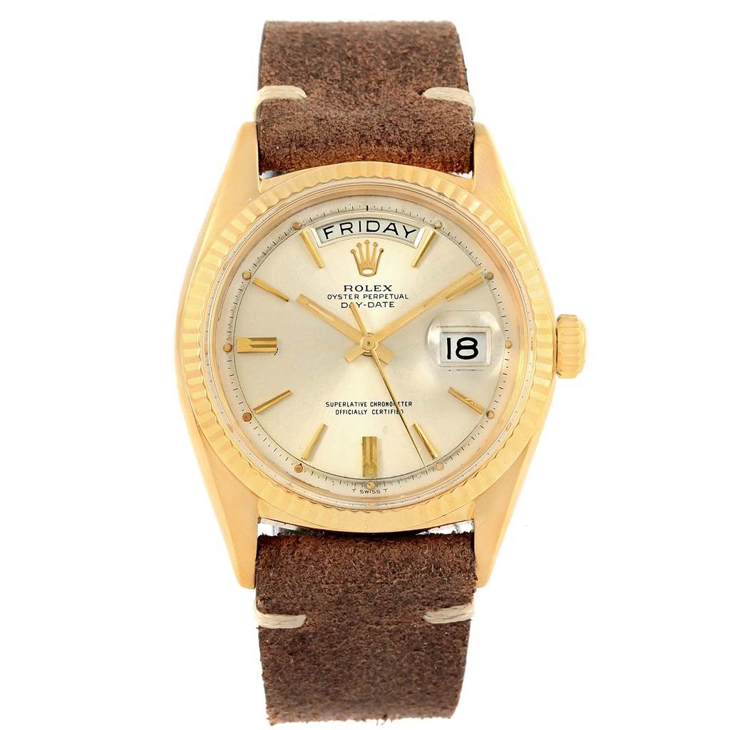 The Rolex President 1803 Men's Yellow Gold Silver Dial 1803 Men's Yellow Gold Silver Dial model watch is shown from the front, displaying its dial, day and date functions, and brown leather strap.