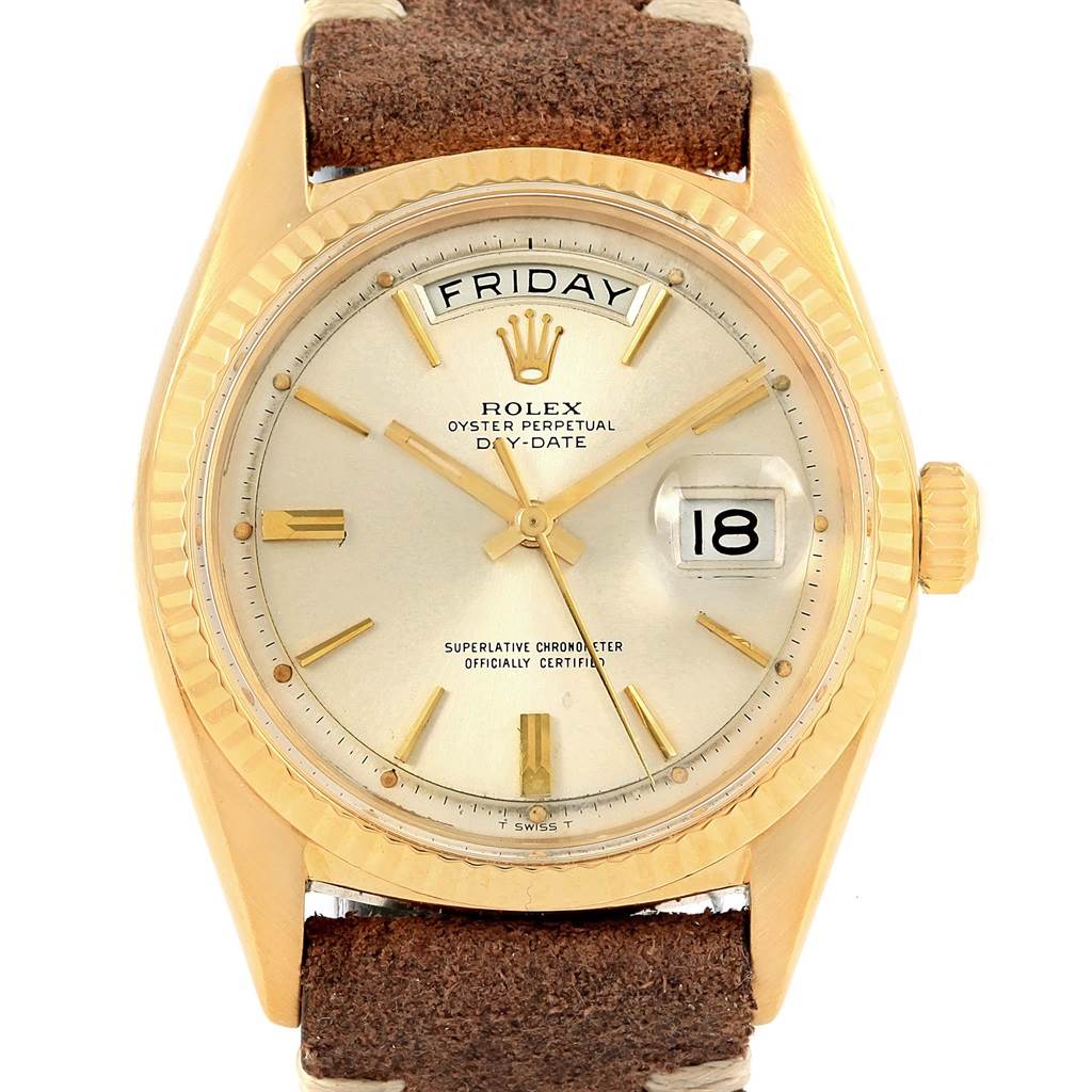 This image shows a frontal view of a Rolex President 1803 Men's Yellow Gold Silver Dial 1803 Men's Yellow Gold Silver Dial Day-Date watch, highlighting the dial, hands, crown, and part of the strap.
