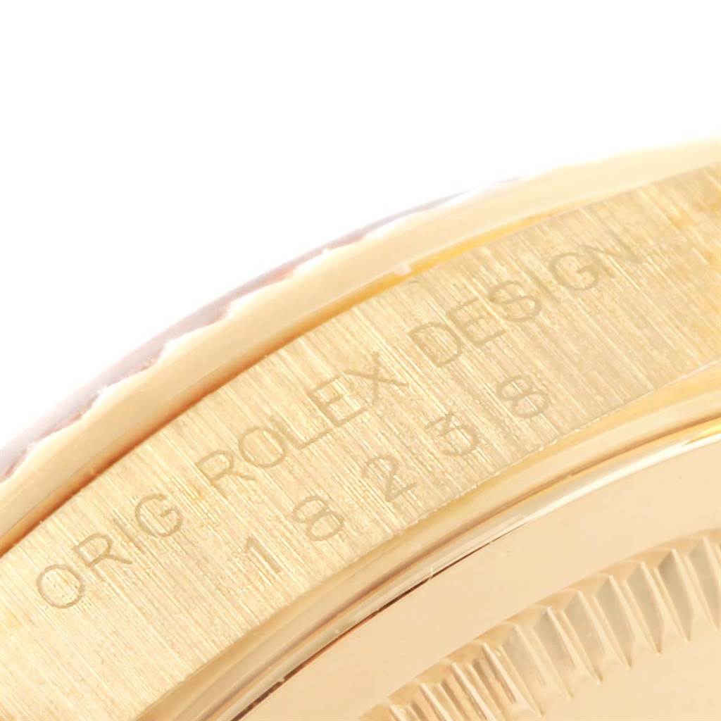 This close-up shows the case side of the Rolex President 18238 Men's Yellow Gold Champagne Dial 18238 Men's Yellow Gold Champagne Dial model, highlighting the engraved text "ORIG ROLEX DESIGN."
