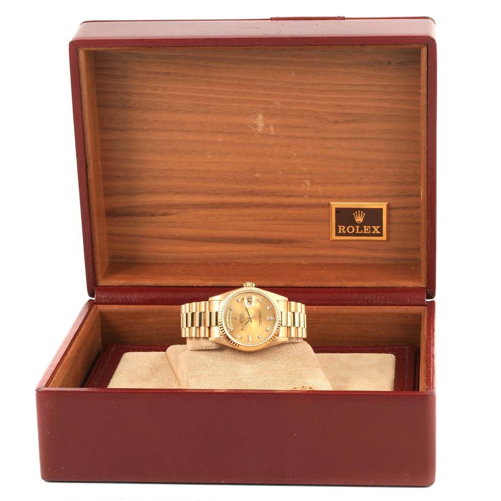 The image shows a Rolex President 18238 Men's Yellow Gold Champagne Dial 18238 Men's Yellow Gold Champagne Dial model watch in a wooden Rolex box, taken from a front angle.