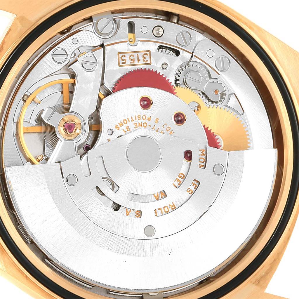 This image shows the inner mechanical movement of a Rolex President 18238 Men
s Yellow Gold Champagne Dial 18238 Men
s Yellow Gold Champagne Dial model watch from a close-up top view.