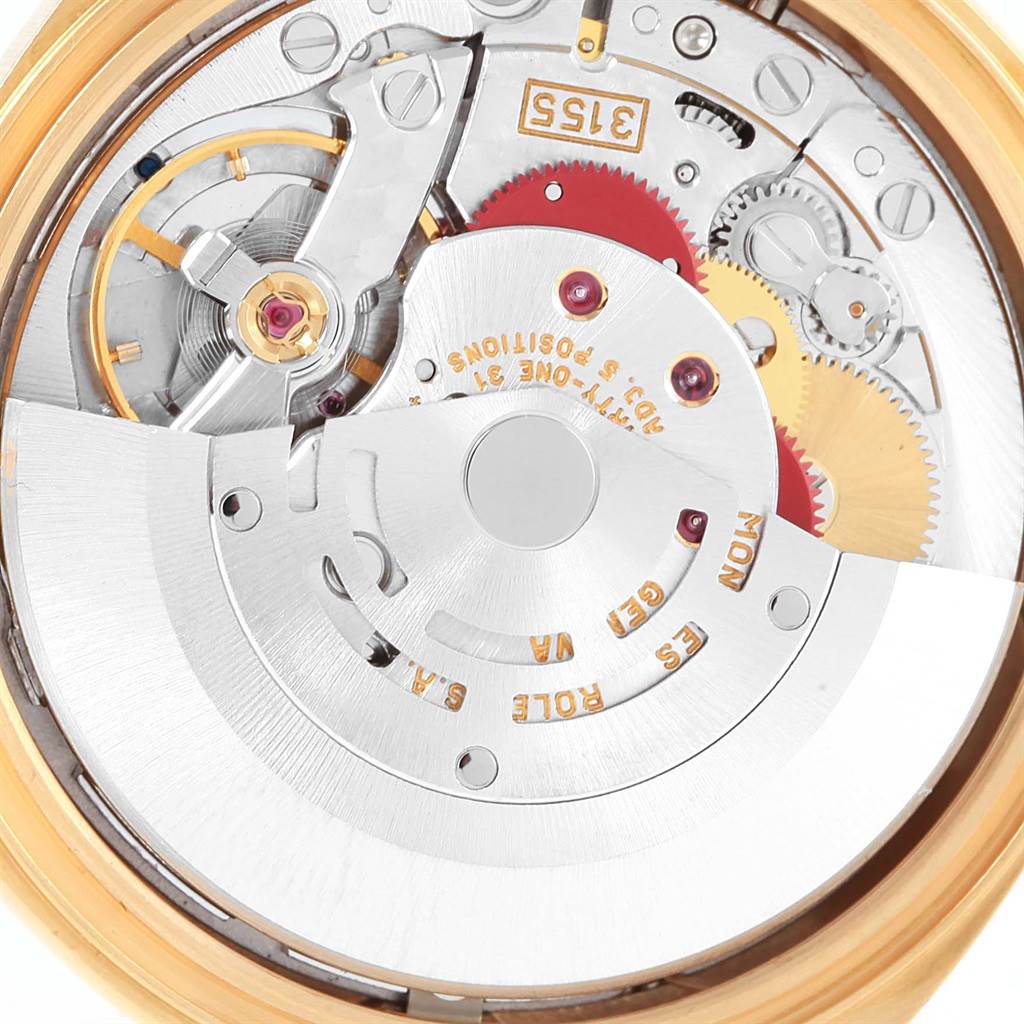 This image shows a close-up view of the internal movement mechanism of the Rolex President 18238 Men
s Yellow Gold White Dial 18238 Men
s Yellow Gold White Dial model watch.