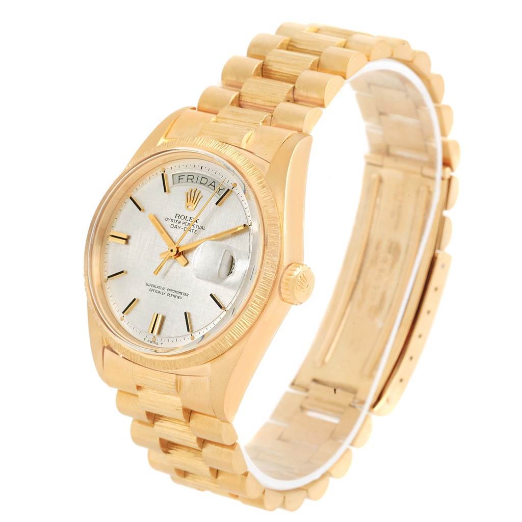 The Rolex President 1807 Men's Yellow Gold Silver Dial 1807 Men's Yellow Gold Silver Dial model watch is shown from an angled view highlighting the face, bezel, and band.