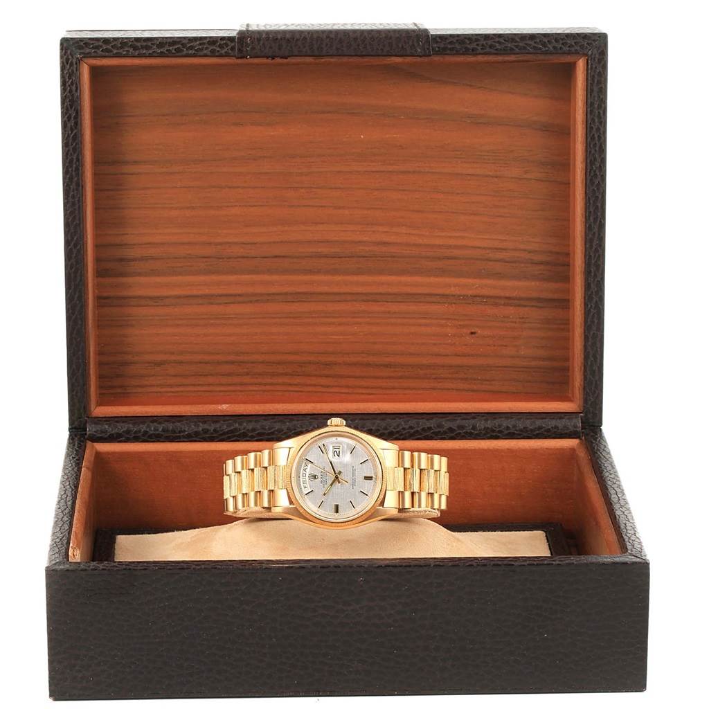 The Rolex President 1807 Men's Yellow Gold Silver Dial 1807 Men's Yellow Gold Silver Dial model watch is shown front-facing inside an open wooden box.