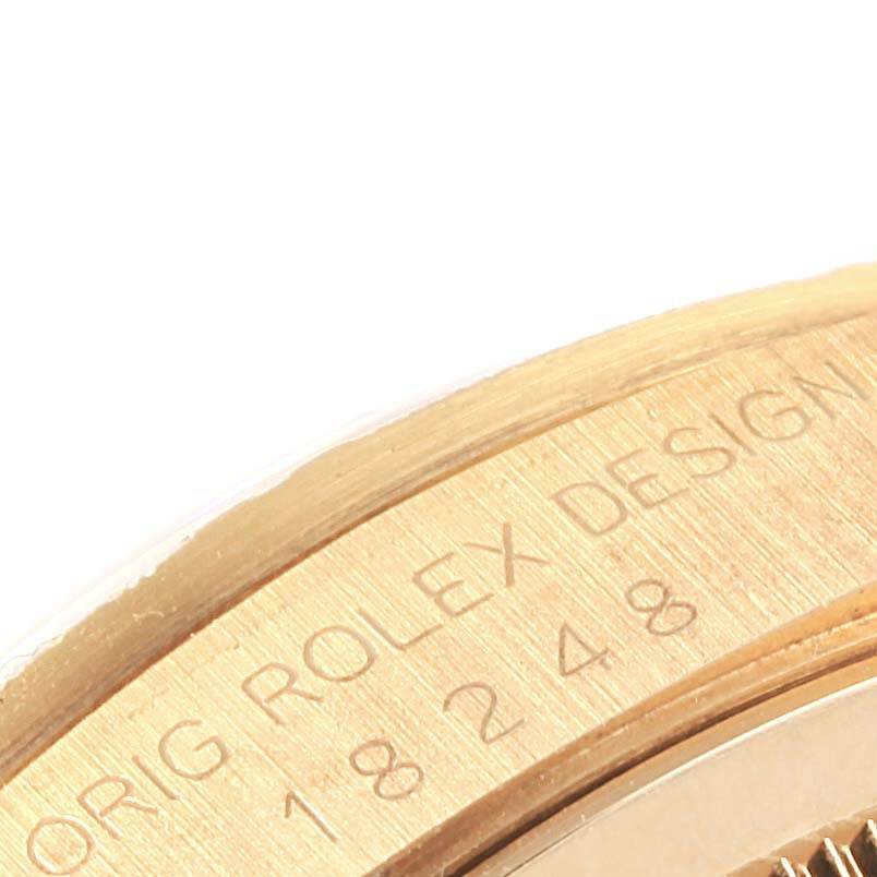 This image shows an up-close view of the side and engraving of the Rolex President 18248 Men's Yellow Gold Champagne Dial 18248 Men's Yellow Gold Champagne Dial watch, including the model number.