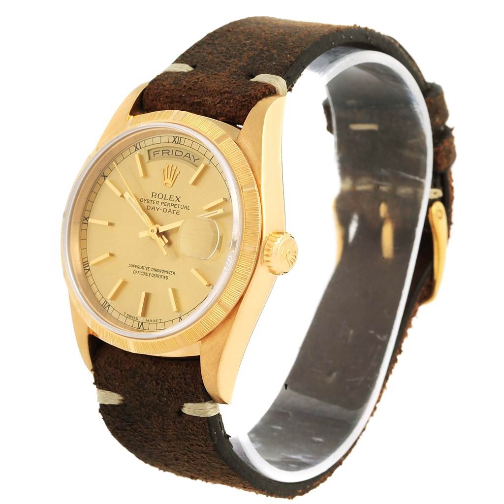 This image shows a side and front angle of a Rolex President 18248 Men's Yellow Gold Champagne Dial 18248 Men's Yellow Gold Champagne Dial model watch, featuring a gold case and brown leather strap.
