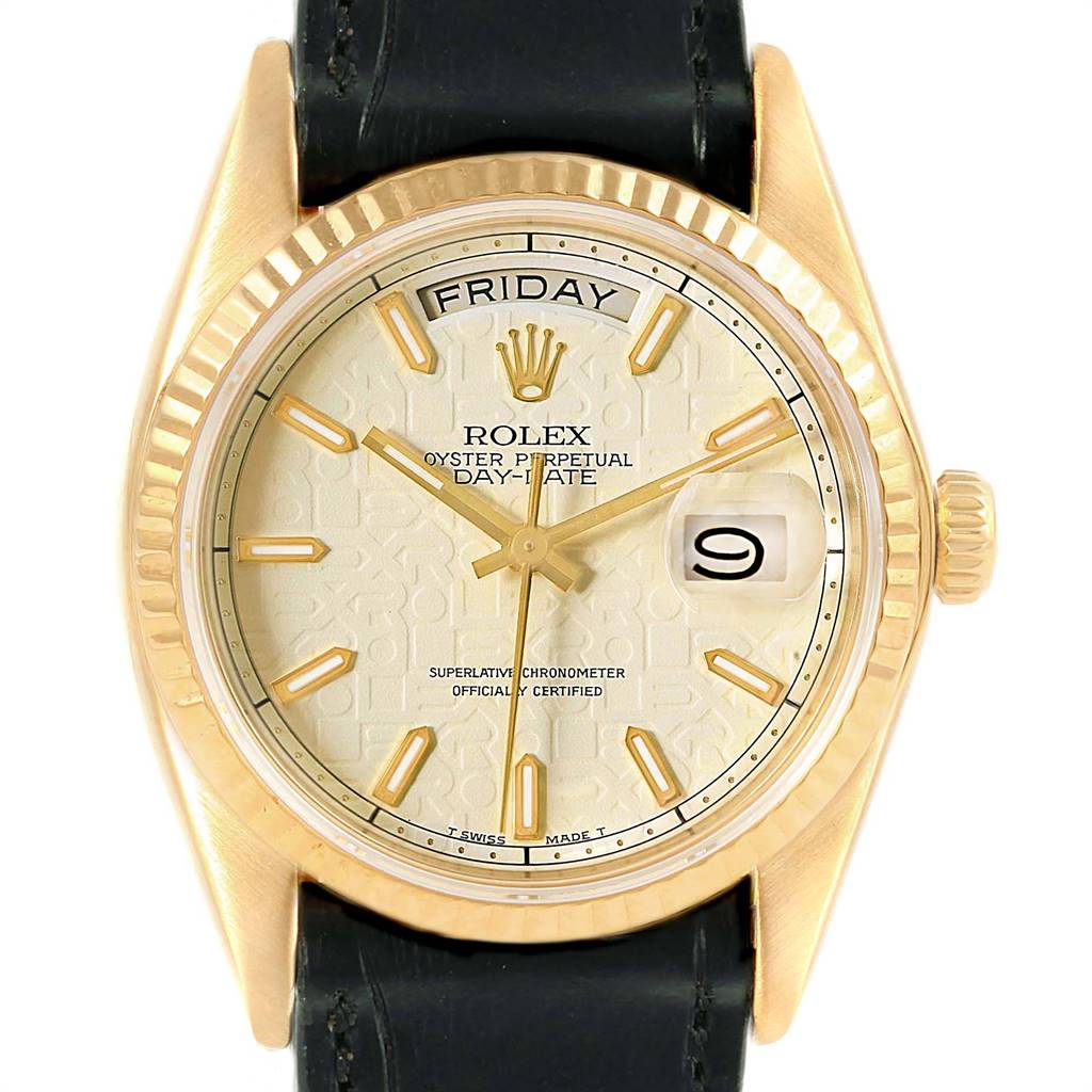 The image shows the face and bezel of a Rolex President 18038 Men
s Yellow Gold Beige Dial 18038 Men
s Yellow Gold Beige Dial model, including the day and date display, crown, and part of the leather strap.