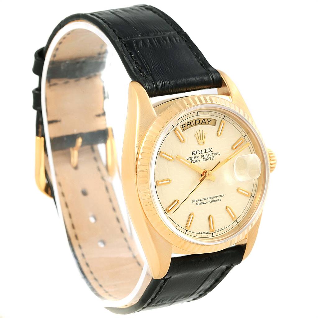 The image shows a front-side view of a Rolex President 18038 Men
s Yellow Gold Beige Dial 18038 Men
s Yellow Gold Beige Dial model watch with a black leather strap and gold case.