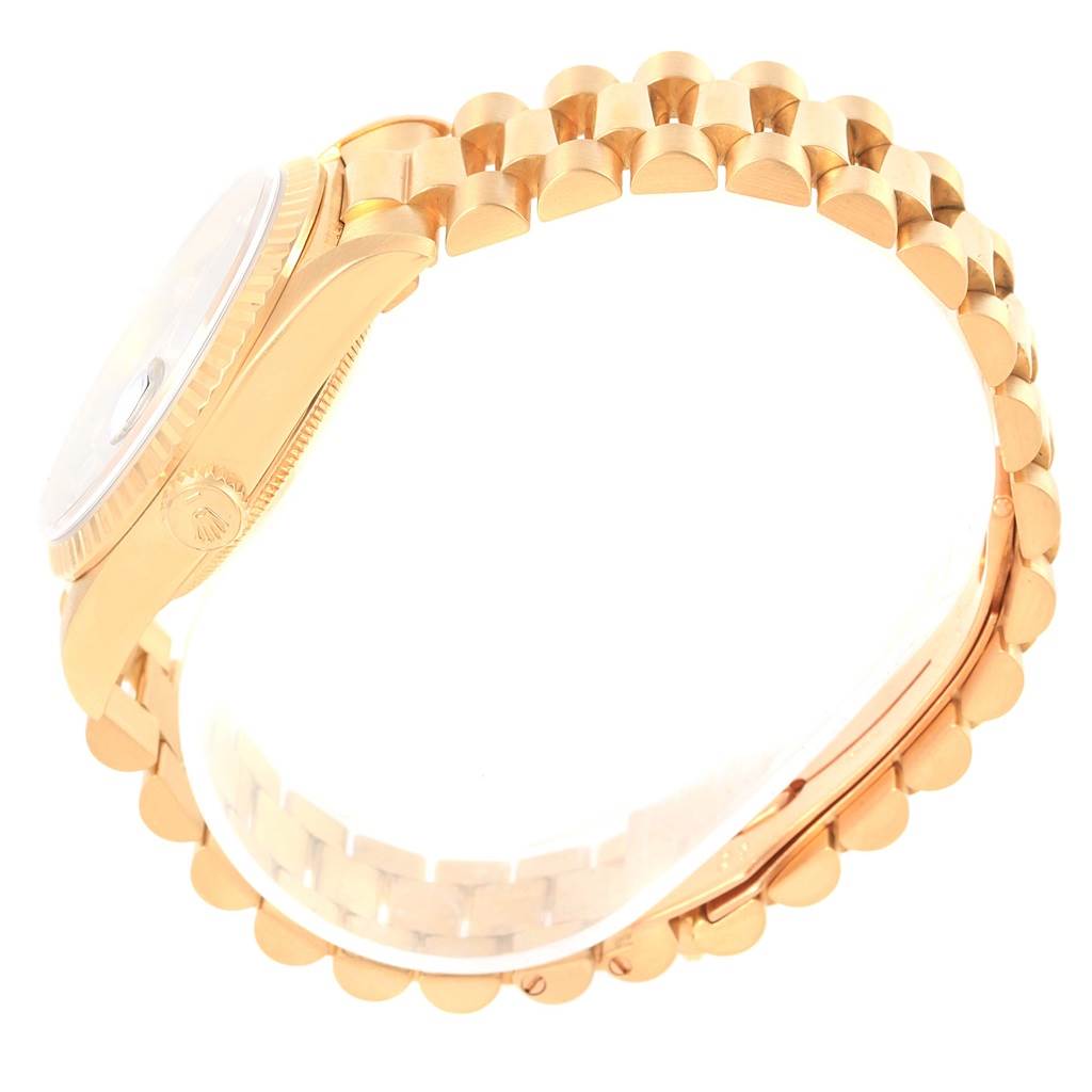 The image shows a side view of the Rolex President 18238 Men's Yellow Gold Black Dial 18238 Men's Yellow Gold Black Dial model watch, highlighting its gold case, crown, and band.