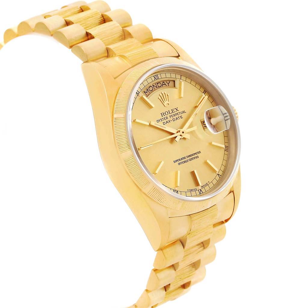 This Rolex President 18078 Men's Yellow Gold Champagne Dial 18078 Men's Yellow Gold Champagne Dial model watch is shown from an angled side view, highlighting its gold bracelet, dial, day-date display, and crown.