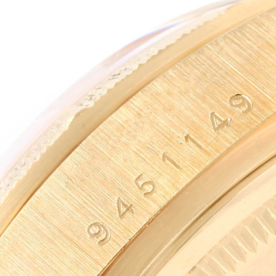 The image shows a close-up angle of the side of a Rolex President 18078 Men's Yellow Gold Champagne Dial 18078 Men's Yellow Gold Champagne Dial model watch, highlighting the engraved serial number.