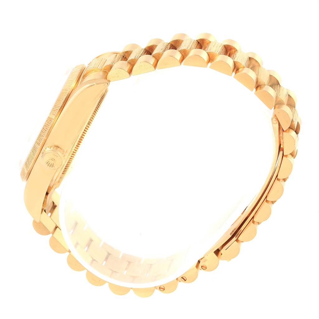 The image shows a side view of the band and the crown of the Rolex President 18078 Men's Yellow Gold Champagne Dial 18078 Men's Yellow Gold Champagne Dial model watch.