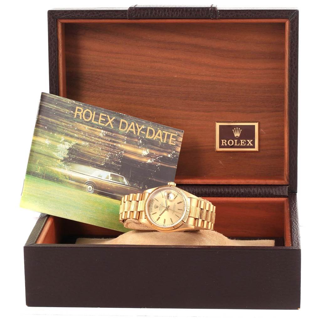 The image shows a Rolex President 18078 Men's Yellow Gold Champagne Dial 18078 Men's Yellow Gold Champagne Dial model watch and booklet inside an open wooden display box, viewed from the front.