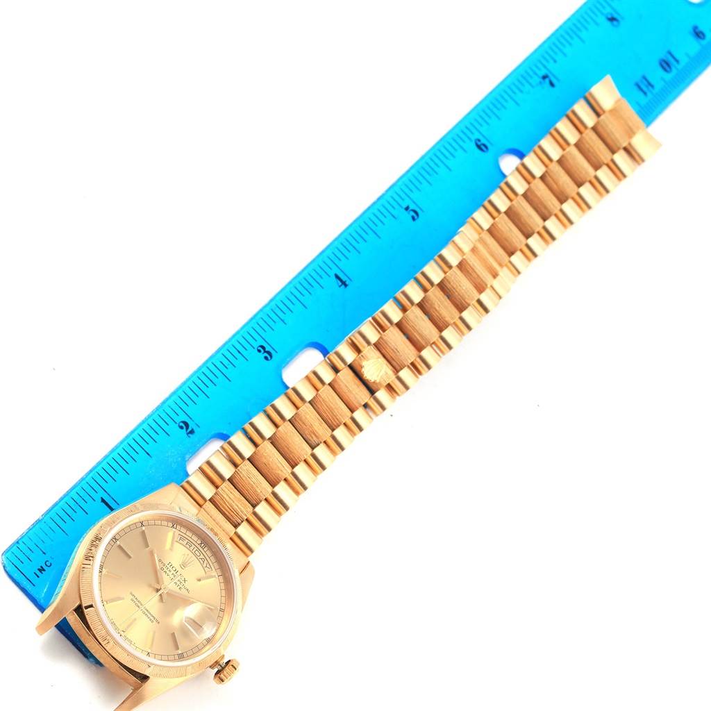 The image shows a Rolex President 18248 Men's Yellow Gold Champagne Dial 18248 Men's Yellow Gold Champagne Dial model watch lying flat next to a blue ruler for measurement.