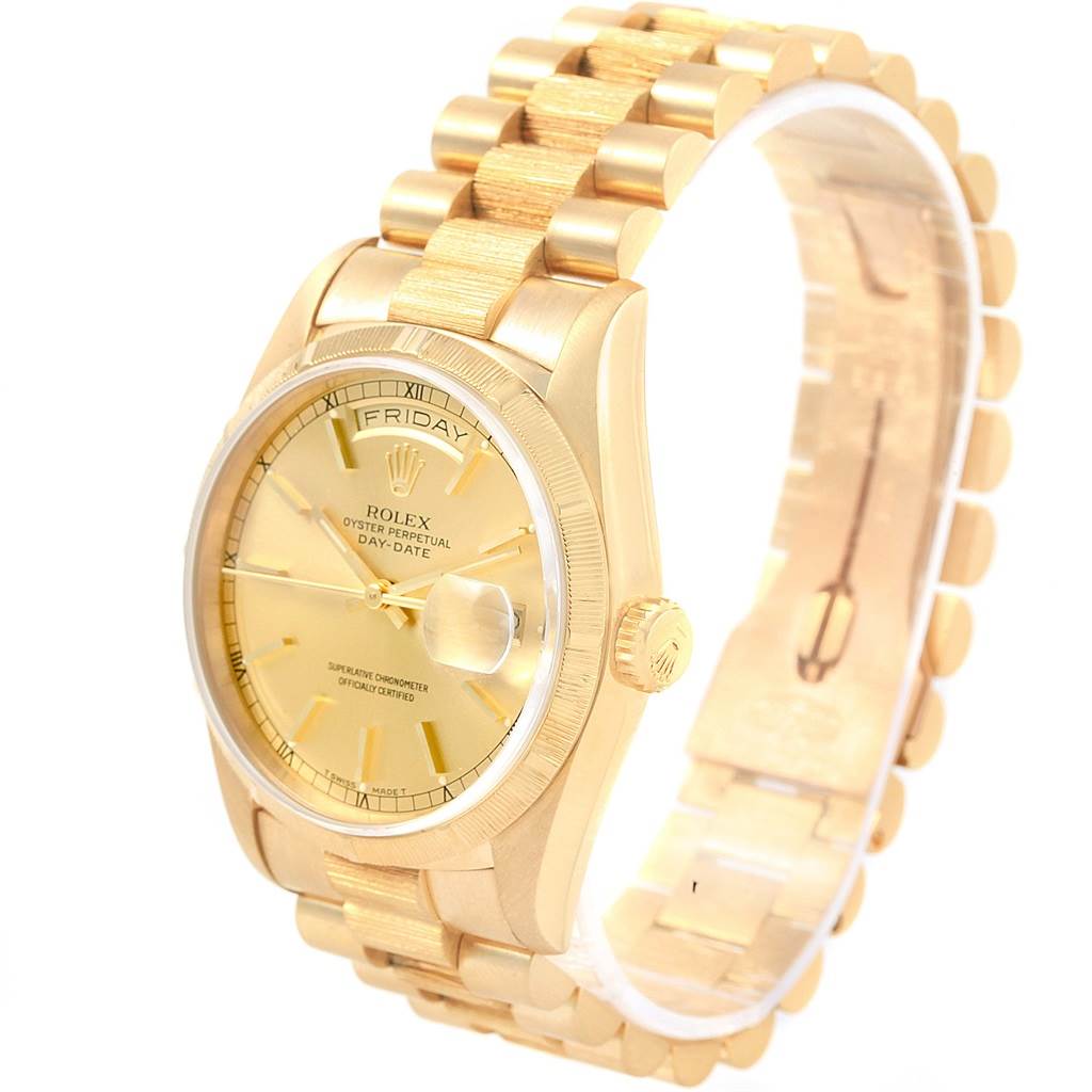 The Rolex President 18248 Men's Yellow Gold Champagne Dial 18248 Men's Yellow Gold Champagne Dial model watch is shown at a slight angle, displaying its gold case, bracelet, dial, and day-date feature.