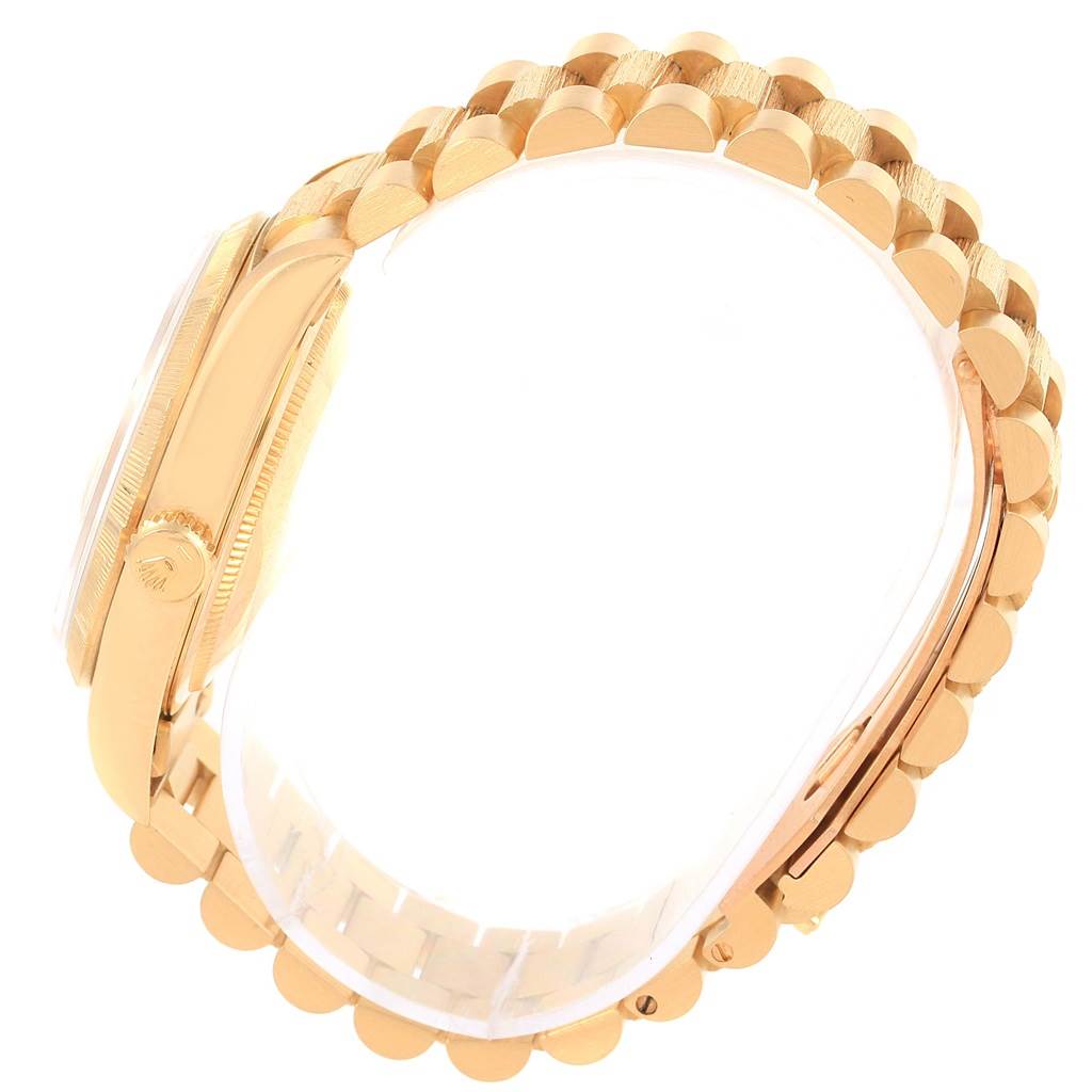 This image shows the side view of the Rolex President 18248 Men's Yellow Gold Champagne Dial 18248 Men's Yellow Gold Champagne Dial model watch, highlighting the bracelet and crown.