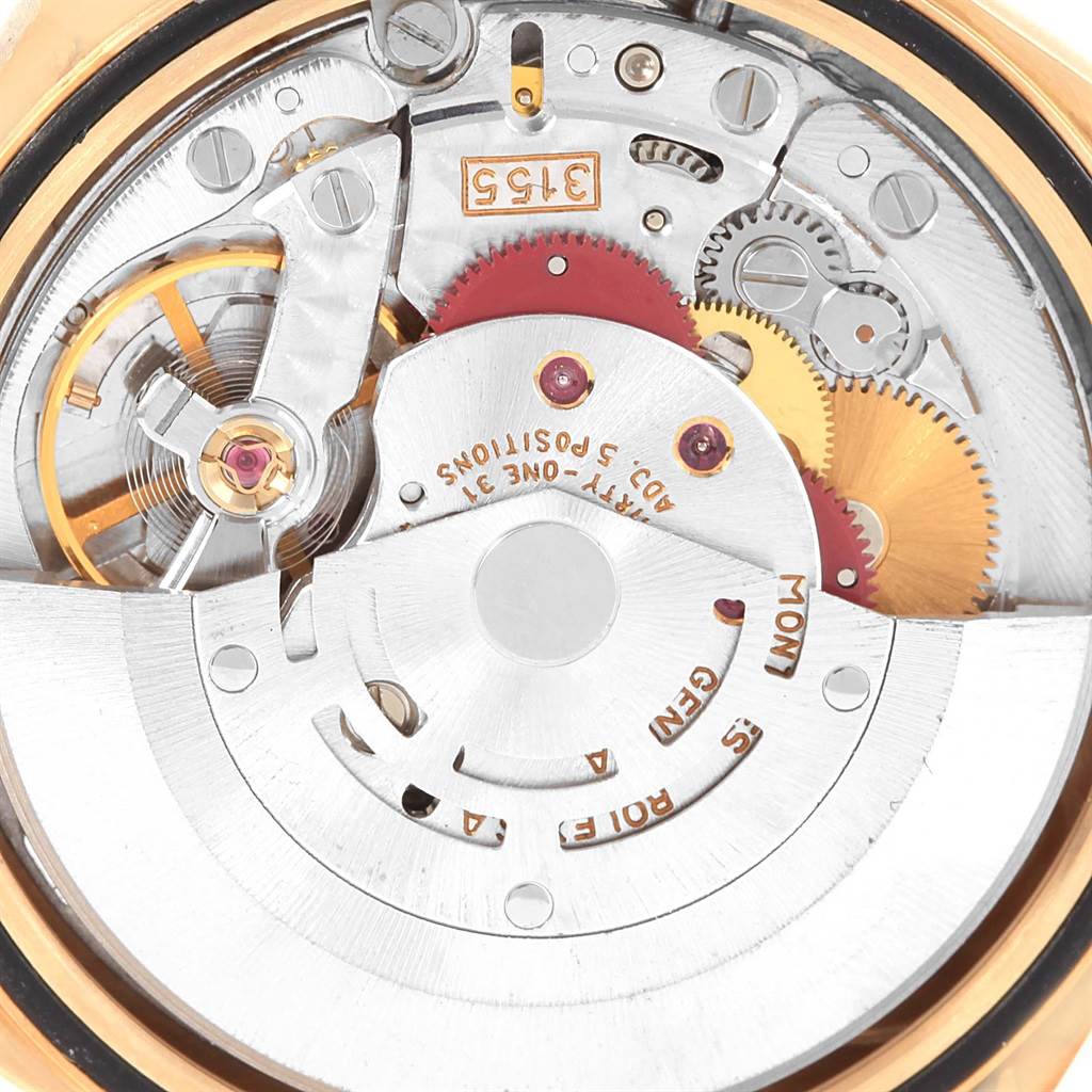 The image shows a close-up view of the internal movement and gears of a Rolex President 18238 Men's Yellow Gold White Dial 18238 Men's Yellow Gold White Dial watch.