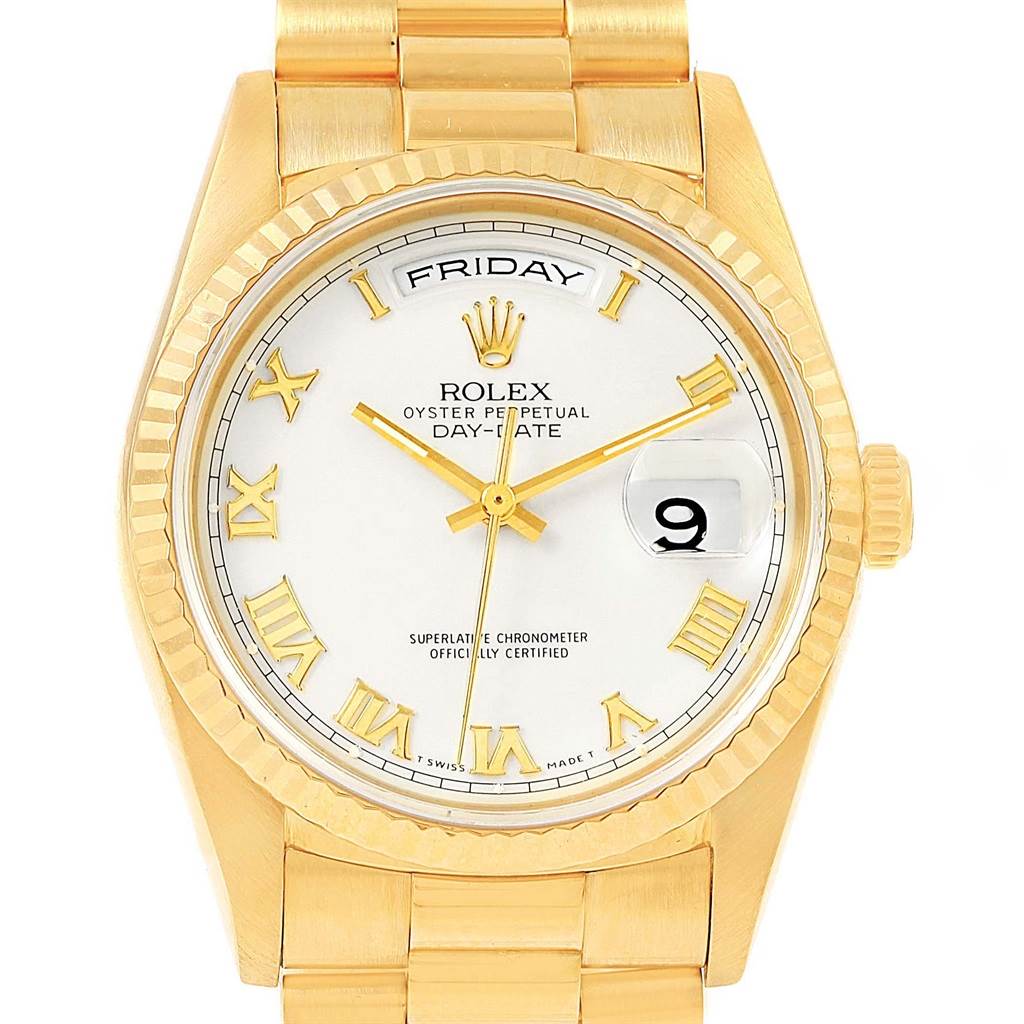 The image shows a frontal view of a Rolex President 18238 Men's Yellow Gold White Dial 18238 Men's Yellow Gold White Dial model, highlighting its gold case, white dial, day and date displays, and Roman numerals.