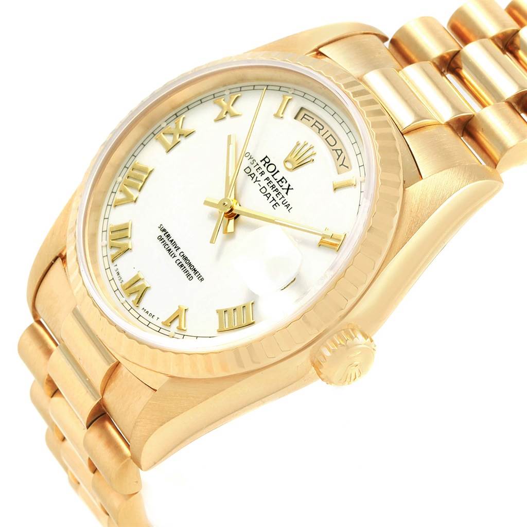 The image shows a Rolex President 18238 Men's Yellow Gold White Dial 18238 Men's Yellow Gold White Dial model watch from an angled view, highlighting its dial, bracelet, and crown.