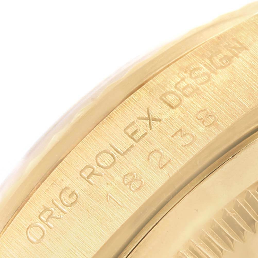 This image shows a close-up of the engraved bezel and case side of a Rolex President 18238 Men's Yellow Gold White Dial 18238 Men's Yellow Gold White Dial model, highlighting "ORIG ROLEX DESIGN."