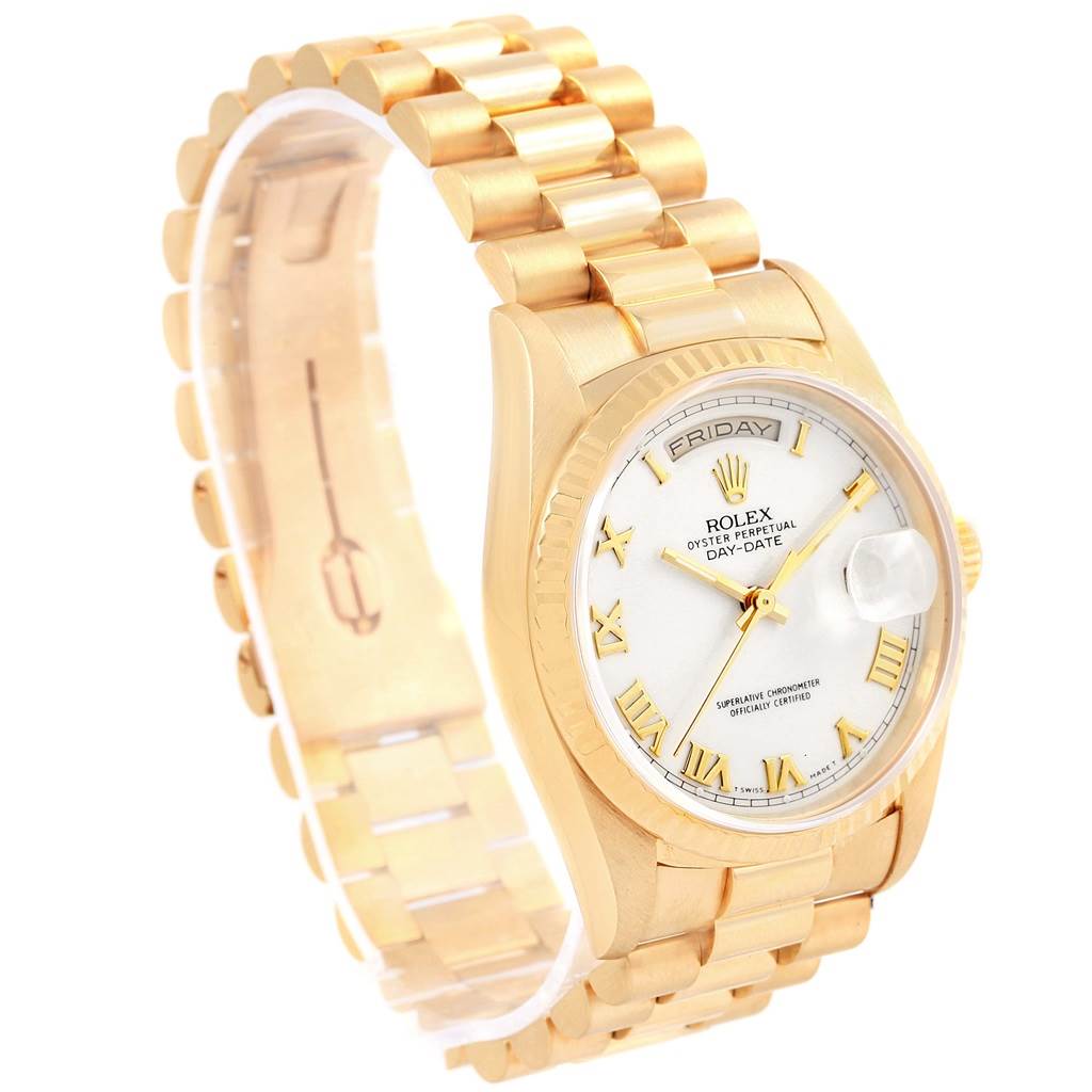 The Rolex President 18238 Men's Yellow Gold White Dial 18238 Men's Yellow Gold White Dial model watch is shown at an angle, highlighting its gold bracelet, white dial, and day-date display.