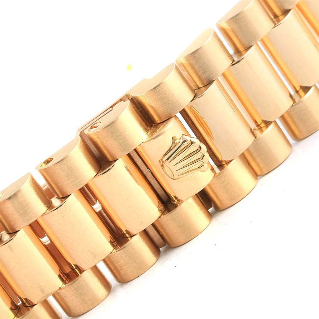 The image shows a close-up angle of the gold bracelet links of a Rolex President 18038 Men's Yellow Gold Blue Dial 18038 Men's Yellow Gold Blue Dial model watch.