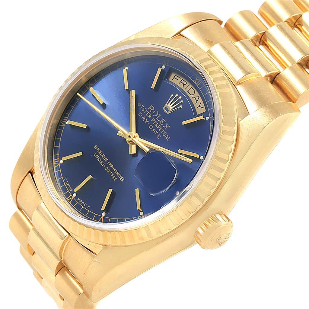The image shows a Rolex President 18038 Men's Yellow Gold Blue Dial 18038 Men's Yellow Gold Blue Dial model watch at a slight diagonal angle, highlighting its blue dial, gold case, and bracelet.