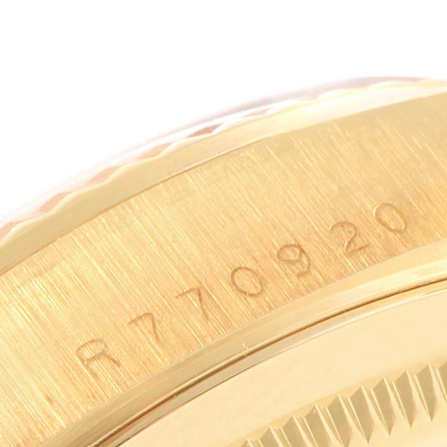 The image shows a close-up of the serial number engraving on the case side of a Rolex President 18238 Men's Stainless Steel Champagne Dial 18238 Men's Stainless Steel Champagne Dial model watch.