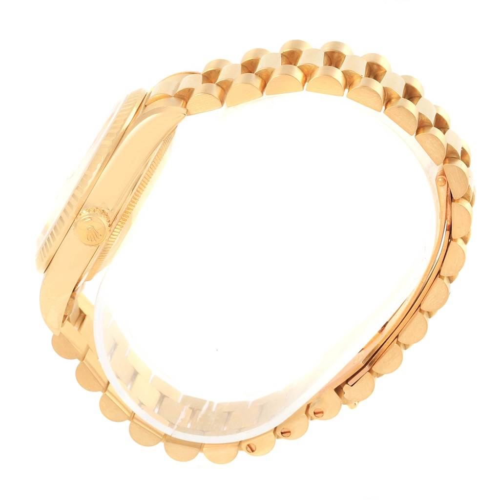 The Rolex President 17194 Men's Yellow Gold Champagne Dial 17194 Men's Yellow Gold Champagne Dial model watch is shown from a side angle, highlighting the crown and bracelet.