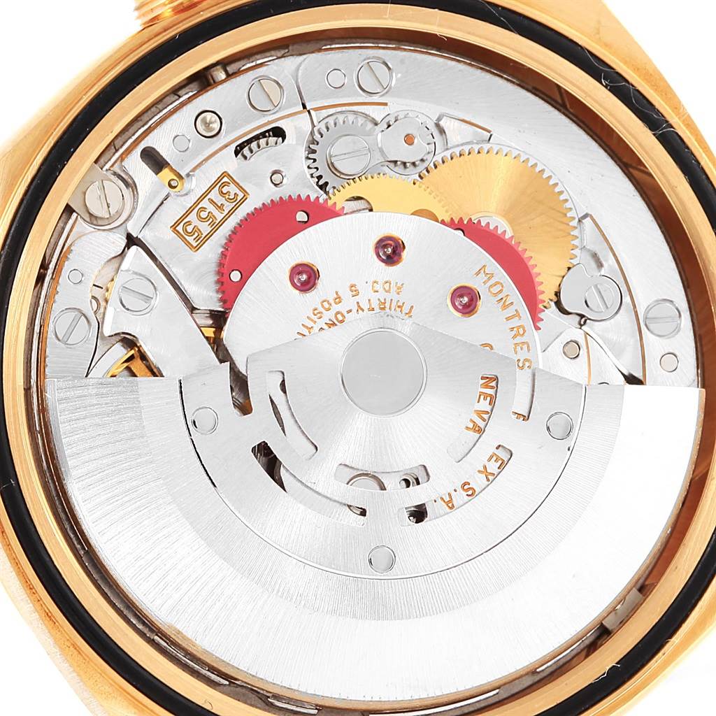 This image shows a close-up view of the internal mechanical movement of the Rolex President 18238 Men's Yellow Gold Black Dial 18238 Men's Yellow Gold Black Dial model watch.