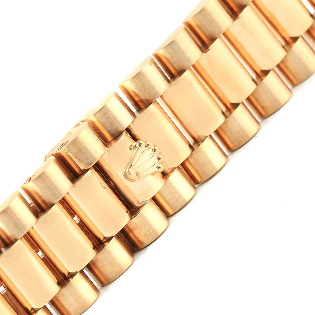The image shows a close-up view of the gold bracelet clasp of a Rolex President 18238 Men's Yellow Gold Brown Dial 18238 Men's Yellow Gold Brown Dial model watch.