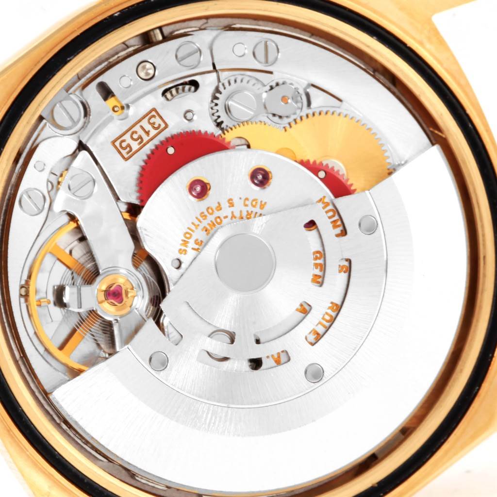 This is a close-up view of the movement and inner workings of the Rolex President 18238 Men's Yellow Gold Brown Dial 18238 Men's Yellow Gold Brown Dial model watch.