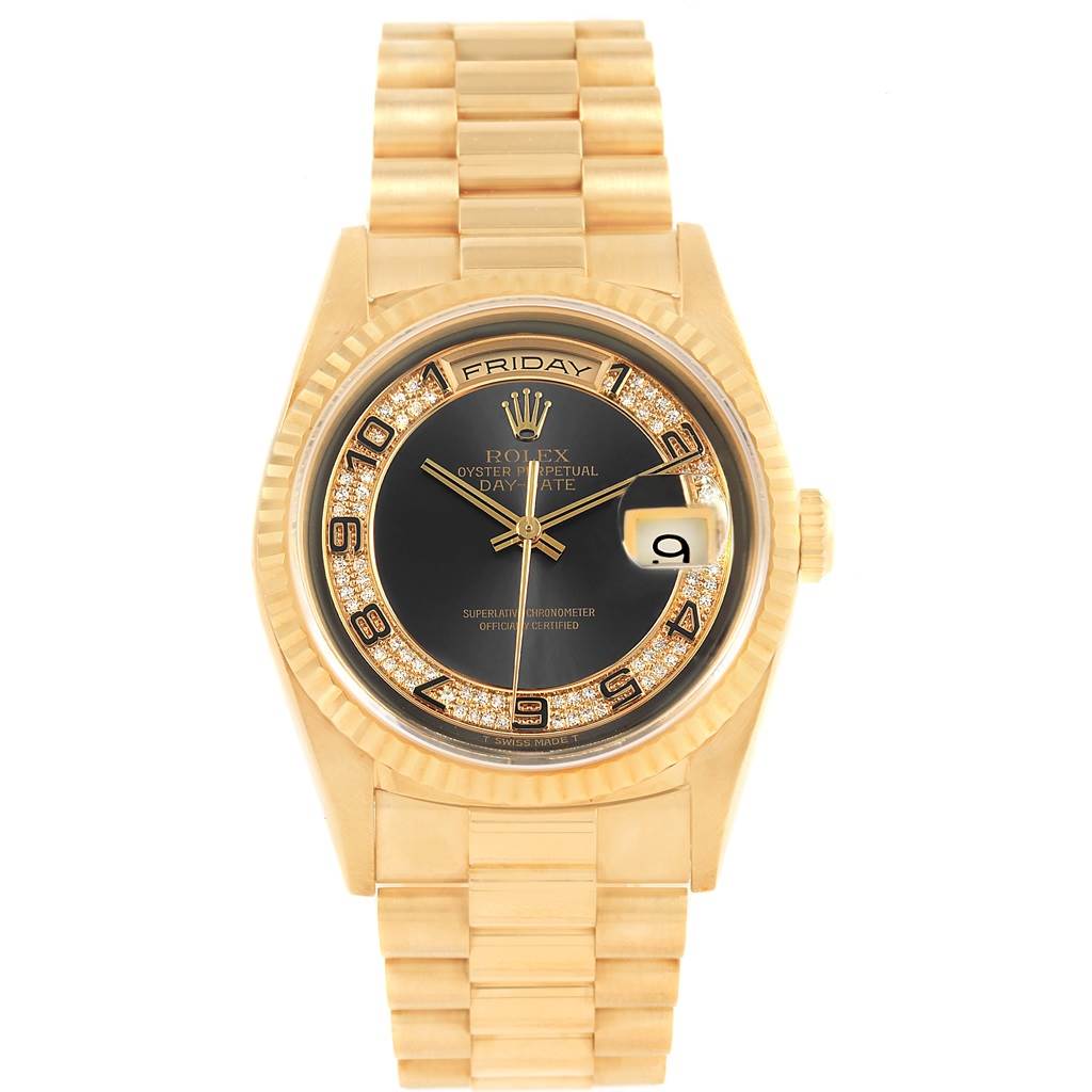 The Rolex President 18238 Men's Yellow Gold Brown Dial 18238 Men's Yellow Gold Brown Dial model watch is shown from a top-down angle, featuring its gold band, black dial, day-date display, and diamond hour markers.