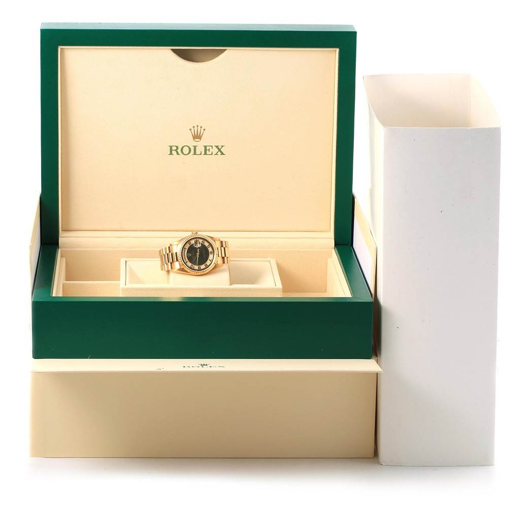 The image shows a front view of the Rolex President 18238 Men's Yellow Gold Brown Dial 18238 Men's Yellow Gold Brown Dial model watch inside its green and beige presentation box.
