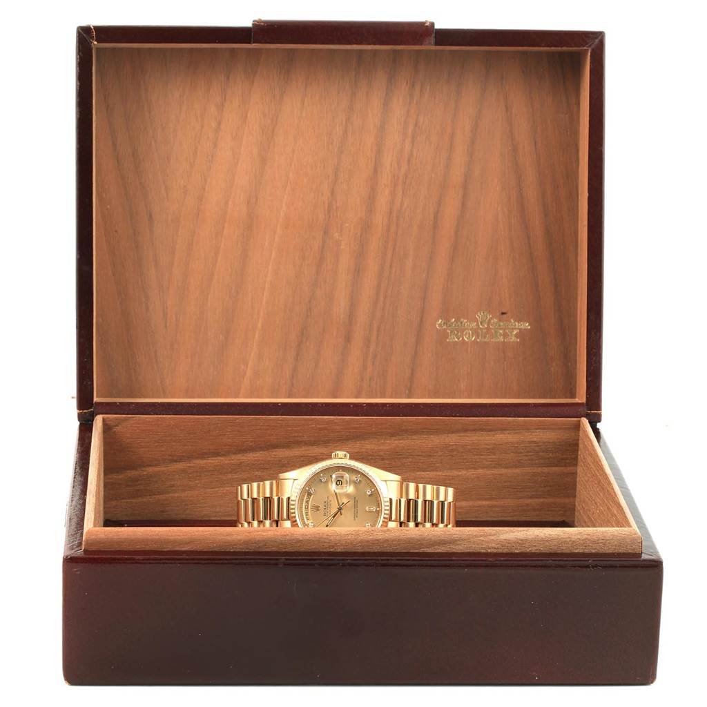 The image shows a Rolex President 18238 Men's Yellow Gold Champagne Dial 18238 Men's Yellow Gold Champagne Dial model watch inside an open wooden Rolex box, viewed from the front.