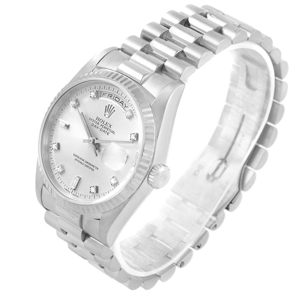 The image shows a Rolex President 18239 Men's White Gold Silver Dial 18239 Men's White Gold Silver Dial Day-Date watch featuring its face, bracelet, and clasp at a three-quarter angle.