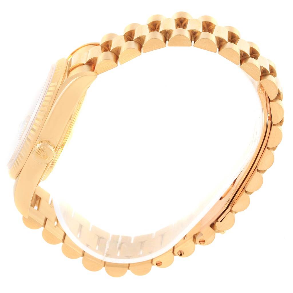 The image shows a side view of a Rolex President 18238 Men's Yellow Gold Champagne Dial 18238 Men's Yellow Gold Champagne Dial model watch, highlighting its gold case and bracelet.